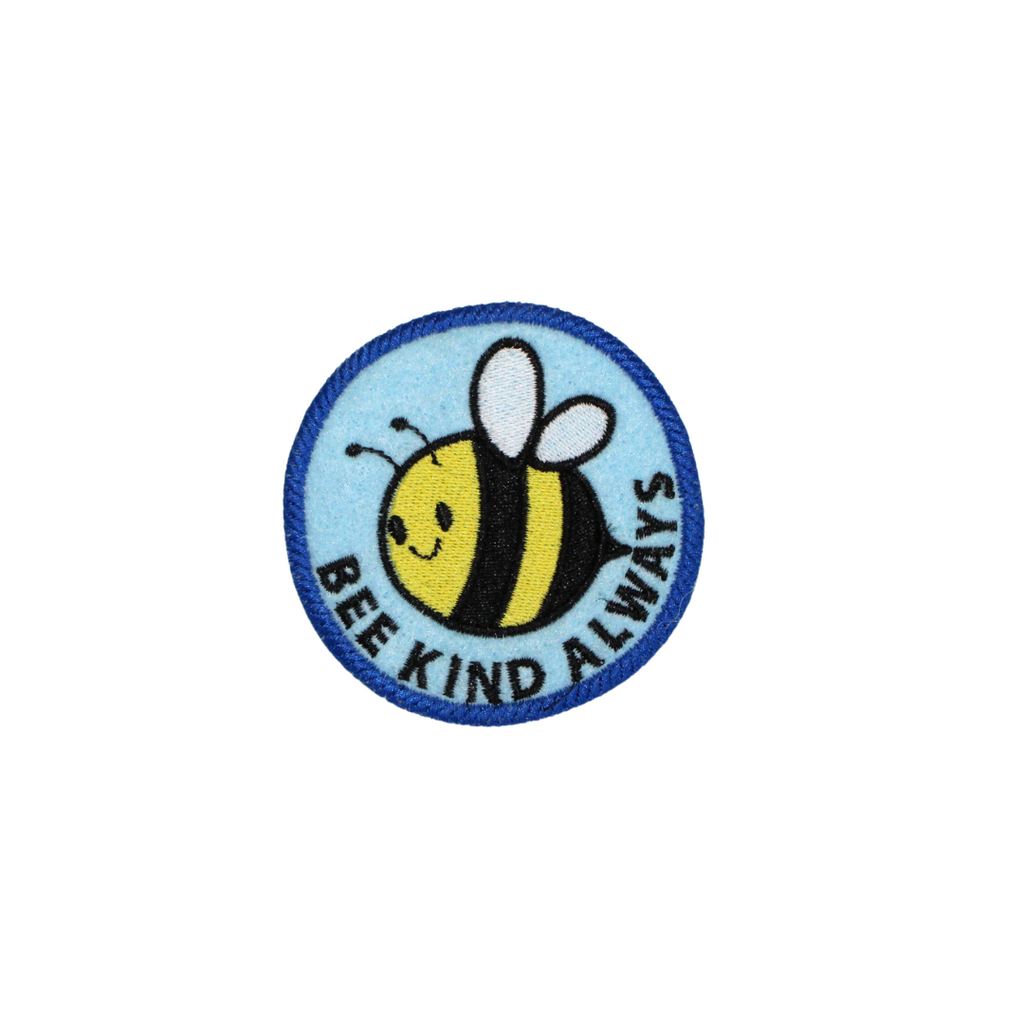 Circular patch with a bee illustration and 'Bee Kind Always' text on a white background